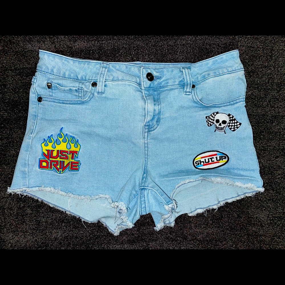 Woman’s Blackheart Low Rise Jean Shorts w/ Skull & Just Drive Patch. Size 9